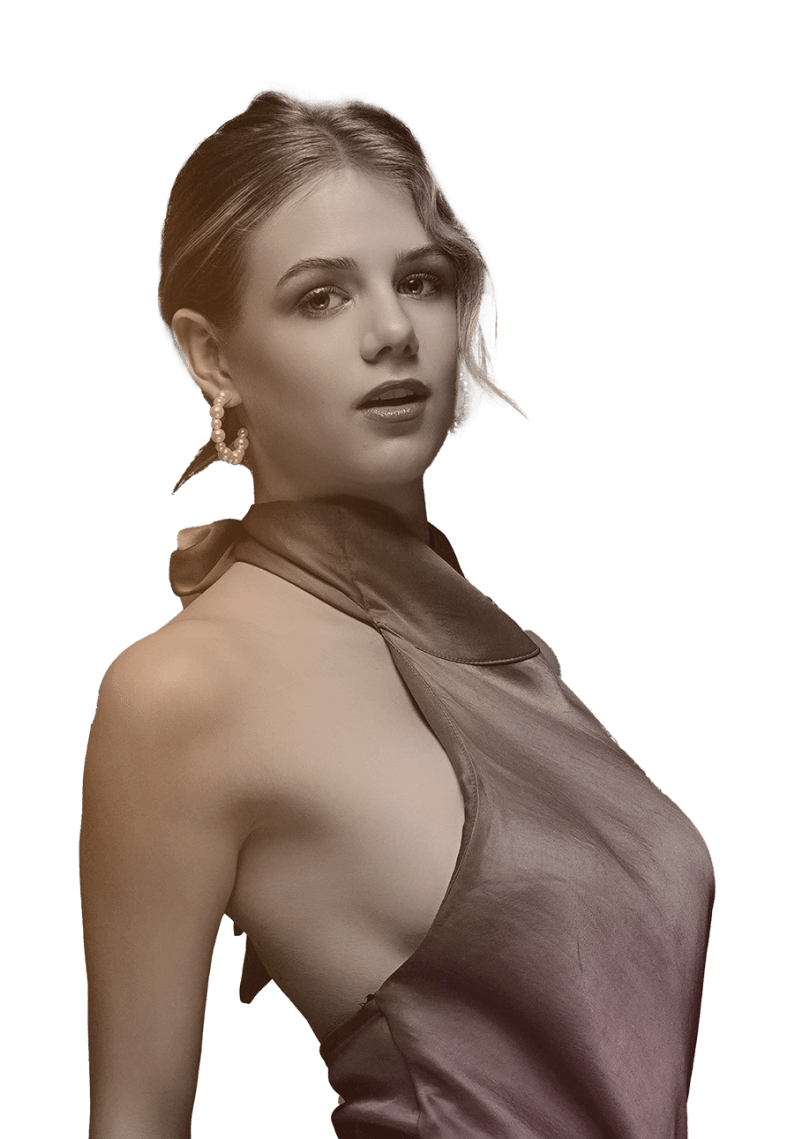 Book peachy talent today Sophisticated woman wearing pearl earrings and a satin halter top, exuding timeless elegance and poise.